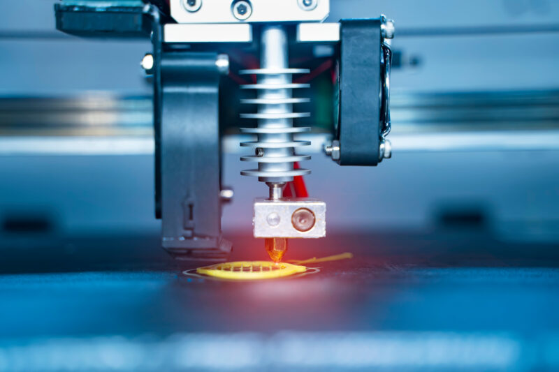 3D printer or additive manufacturing and robotic automation technology.